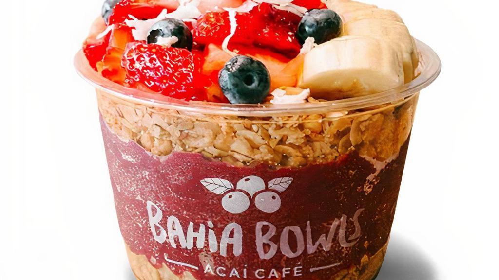 Acai Bowl · Acai base topped granola, strawberries, banana, blueberries, coconut shavings, and honey.