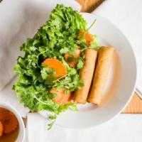 Vietnamese Egg Rolls (2) · Crispy fried Vietnamese egg rolls with marinated ground pork and veggies served with fresh l...