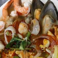 Hot & Sour Seafood Noodle Soup · Hot & Sour Seafood Noodle Soup come with scallop, mussel, shrimp, squid, clam, cabbage, and ...