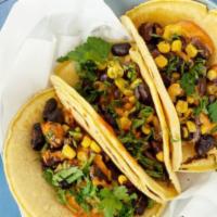 Vegan Tacos · Grilled veggies, sweet plantains, lettuce, corn, pico de gallo and handmade guacamole.
