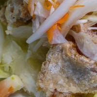 Cabbages Slaw & Yuca (Vigoron Fritangon) · Served with fried pork.