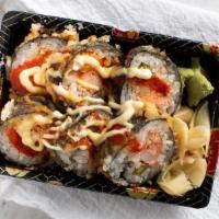 Dynamite Roll · Cooked salmon, crab, asparagus, deep fried in hot sauce, mayo and eel sauce. * 
 
*Popular
