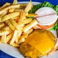 Gourmet Angus Cheddar Burger · With lettuce, tomato onion on a brioche bun with fries and pickle.
