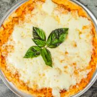 Margarita Pizza · Fresh mozzarella, Mariana, basil, and extra virgin olive oil.