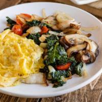 Veggie Grit Bowl · grits topped with sauteed roasted garlic kale and onions, mushrooms, peppers, and two farm f...