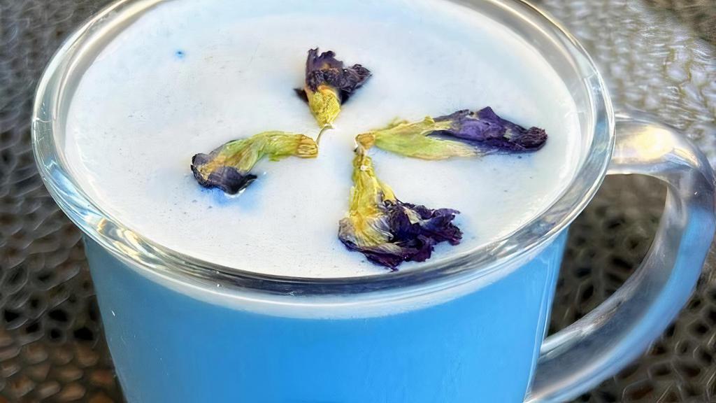 Blue Nectar Latte · Butterfly pea flower tea, milk, and organic vanilla sweetener. Great with an added espresso shot!