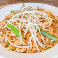 Pad Thai · Thin rice noodles stir fried with beansprouts, green onions, & egg, then topped with ground ...