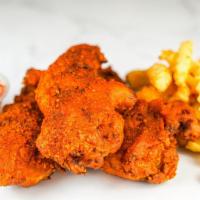 3 Jumbo Hot Tender Combo · 3 of our famous, jumbo, hand-breaded chicken tenders drenched in Nashville Hot Sauce. Served...