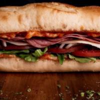 The Italian Sandwich · Ham, salami, cantimpalo, lettuce, tomato, mayo and mozzarella cheese.