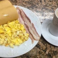 Combo #2 · Huevos revueltos, tostada y café con leche con jamón o bacon. / Scrambled eggs, Cuban toast ...