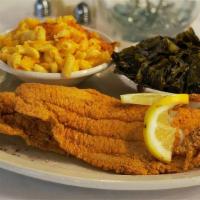Fried Fish Plate · A Golden Fried Tilapia and a choice of two of our amazing sides.