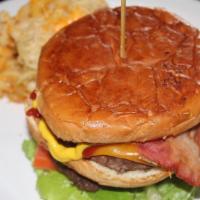 Cheeseburger · The classic cheeseburger with American cheese the toppings you want.  Grilled or fried patty...