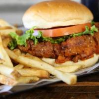 Fried Pork Chop Sandwich · Perfectly fried thick cut pork chop with Texas toast and the toppings you'd love.