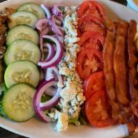 Cobb Salad · Chicken, Applewood smoked bacon, egg, tomato, cucumber, red onion, and blue cheese crumbles.