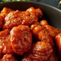 Boneless Wings · Breaded all white meat chicken hand-spun with your choice of signature Donatos wing sauce.