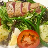 Nicoise Salad · Seared tuna, mixed green, French beans, eggs, tomato, potato, kalamata olives, anchovies and...