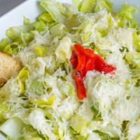 Caesar Salad Combo · Hearts of romaine lettuce, house croutons and shaved Parmesan, tossed in roasted garlic caes...