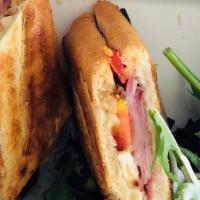 Parisian Baguette Sandwich Combo · Old fashioned ham, Brie cheese, vine-ripened tomatoes, European style butter served on our F...