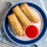Spring Roll · Fried rolls stuffed with vegetables served with sweet and sour sauce.