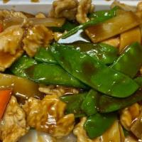 Chicken With Snow Pea Pods · With rice.