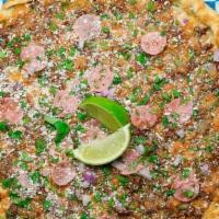 Birria Taco Pizza · Traditional Mexican meat stew made with ancho, guajillo, chile de árbol, a blend of spices t...