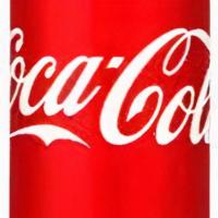 Canned Coke · Quench THAT thirst!