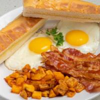 Breakfast Platter · Eggs any style with choice of Ham, Bacon OR Turkey Sausage with house potatoes & Cuban toast