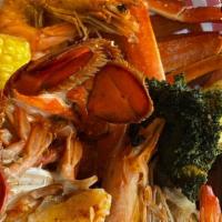 Lobster Tail, Snow Crab And Shrimp Broil · 1 1/2 cluster of snow crabs, 1/2 lb of jumbo shrimp, 1 lobster tail, sausage , corn on the c...