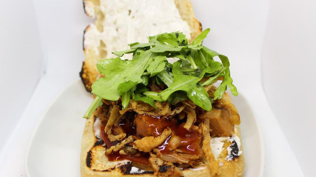 Porkey'S Revenge · Sofrito roasted pork with a guava sauce, topped with homemade fried onions