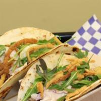 Tacos - Pork · (2) warm flour tortillas filled with Sofrito roasted pork, guava sauce, Southern coleslaw, h...
