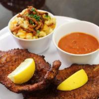 Schnitzel Plate · Pork chop, pounded, breaded and fried, served with a side of your choice and Wurstbusters sa...