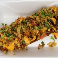 Loaded Canoa · A whole sweet plantain deep fried and filled with roasted rotisserie chicken, slow roasted s...