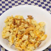 Spaetzle (Side) · German version of Mac & Cheese - egg and flour-based dough made into tiny dumplings cooked i...