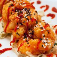 Firecracker Shrimp · crispy colossal shrimp, firecracker sauce, chilled teriyaki noodles, sesame
