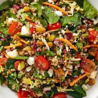 Super Food Salad · Quinoa, Spinach, grape tomatoes, julianned vegetables, feta cheese, dried cranberries, avoca...