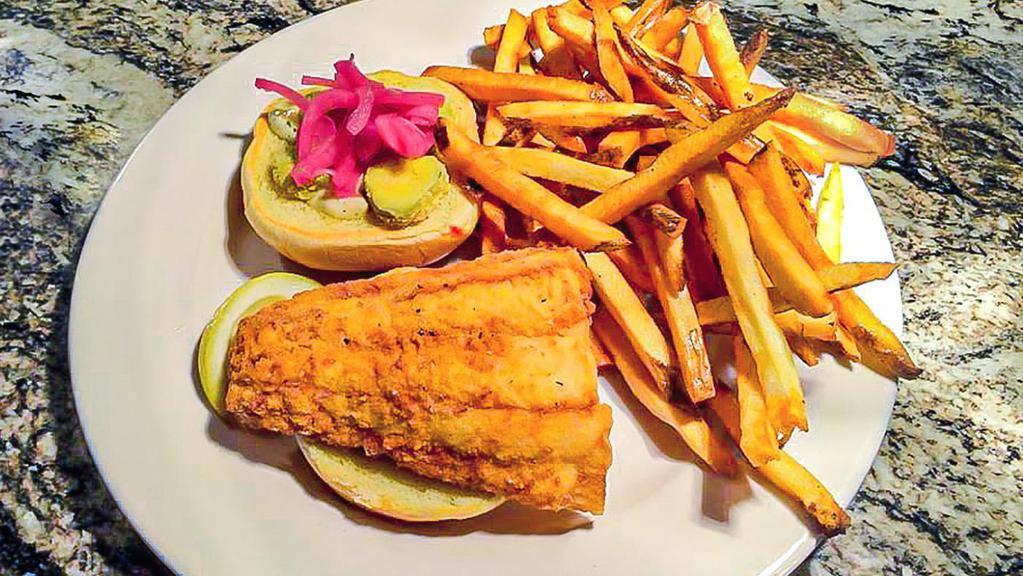 Fish Sandwich · fried haddock, pickled red onion, house pickles, tartar sauce, brioche bun, french fries