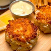 Crab Cakes · super lump blue crab, french fries, coleslaw, remoulade