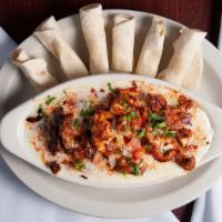 Adobo'S Dip · Cheese dip with grilled chicken, steak, shrimp and pico de gallo.