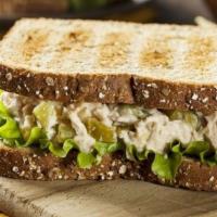 Rio De Janeiro · Chicken mayo salad sandwich with carrot and corn on a multigrain bread and a mixed green sal...