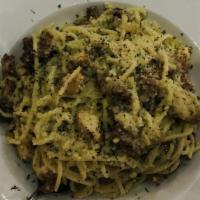 Spaghetti Alla Carbonara · Prepared with bacon, eggs and parmesan.