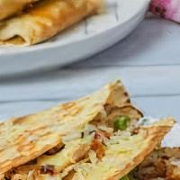 Chicken Quesadilla · Flour tortilla loaded with Monterey Jack cheese & tender chicken breast.  Served with pico d...