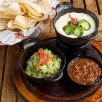 Triple Dip · Guacamole, queso dip, salsa, and chips. Gluten-free. Vegetarian.