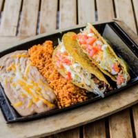 American Tacos · Soft or crunchy tortillas filled with seasoned ground beef, cheddar and jack cheese, shredde...