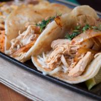 Signature Soft Tacos (Meal) · Signature flour tortillas filled with Monterey jack cheese, roasted chipotle salsa, carameli...