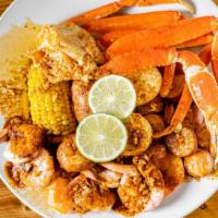 Super Combo · 1/2 lb. snow crab legs, 1/2 lb. shrimps (no head), 1/4 lb. sausage, comes with 2 eggs, 1 com...