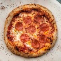 Pepperoni Pizza · Tomato sauce, fresh mozzarella, pepperoni, and oregano.