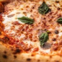 Margherita Pizza · Tomato sauce, fresh mozzarella, and basil.