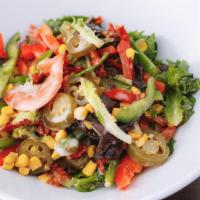 Fire Salad · Mesclun mix, red & green peppers, jalapeños, roasted corn, tomatoes, sun-dried tomatoes & cr...