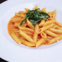 Penne Alla Vodka · Penne cooked in creamy vodka pink sauce.