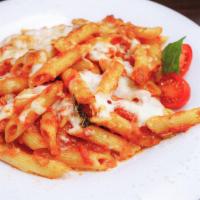 Penne Caprese · Fresh diced mozzarella tossed in a crushed plum tomato & basil sauce.